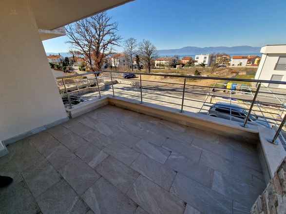 Erdgeschosswohnung mit Garten und Meerblick