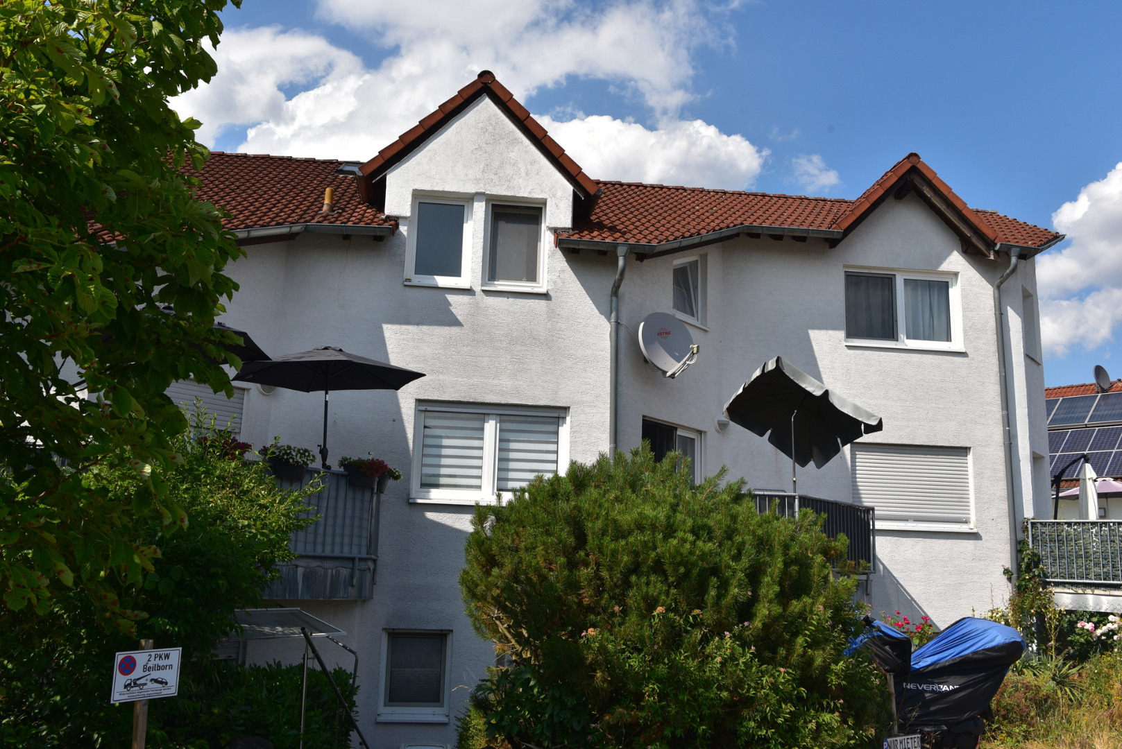 Architekten-Maisonette mit Balkon, Gartenanteil am Feldrand und 2 Stellplätzen. „Haus-Gefühl“!!