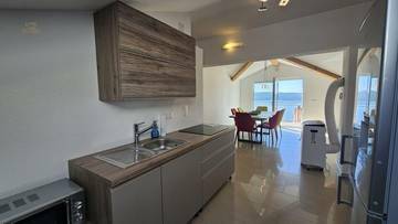 Thumbnail von Dachgeschosswohnung mit Panorama-Meerblick