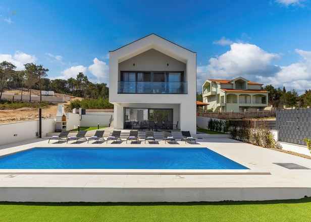 Moderne Villa mit Pool in der 1. Reihe zum Meer