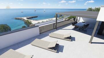 Thumbnail von Modernes Penthouse mit Dachterrasse in der 1. Reihe zum Meer