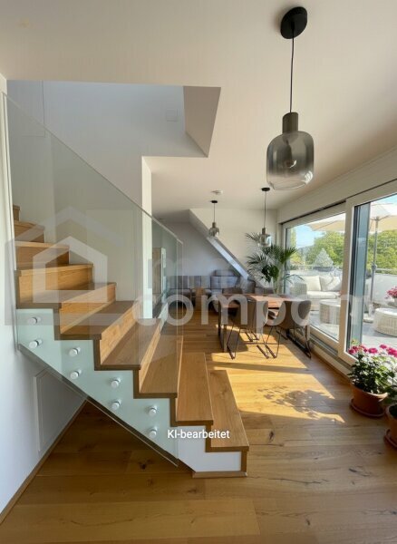 Dachgeschossmaisonette mit einer Traumterrasse und vollmöblierter Küche