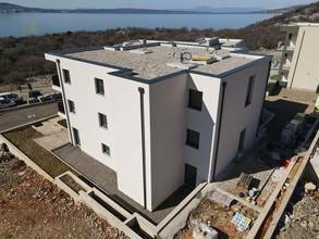 Thumbnail von Modernes Neubau-Appartement mit wunderschönem Meerblick, Garten und privatem Pool