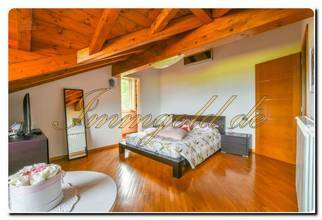 Thumbnail von Immogold Lago Maggiore, attraktive Maisonette in moderner Wohnanlage mit beeindruckendem Seeblick und exklusivem Gemeinschaftspool – ideal für alle, die Komfort, Ruhe und Lebensqualität schätzen.