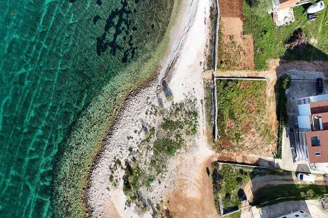 Baugrundstück direkt am Meer