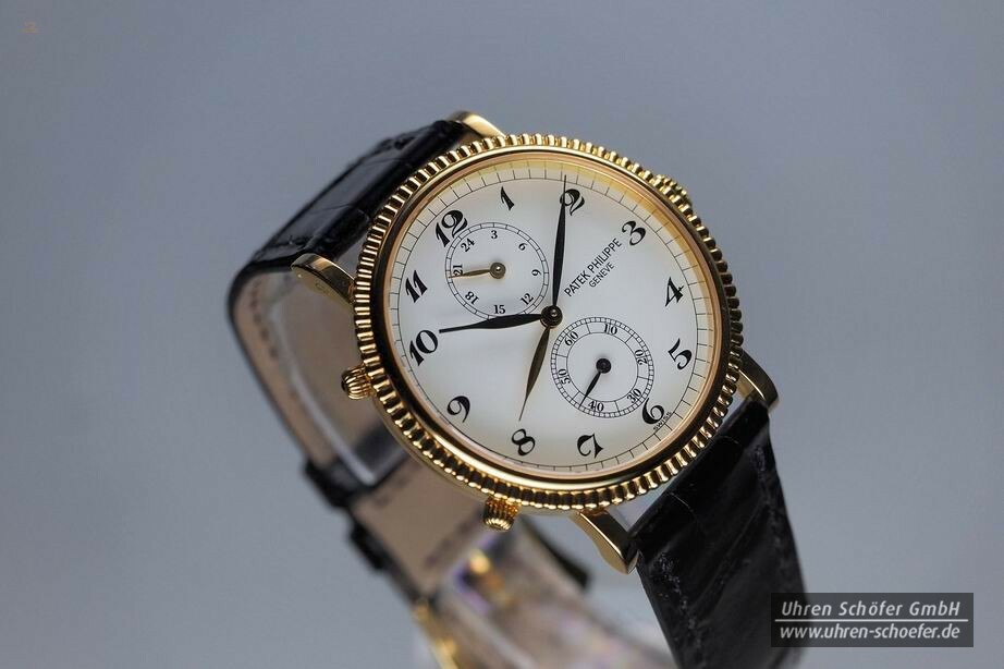 PATEK PHILIPPE "Travel Time" in Gelbgold