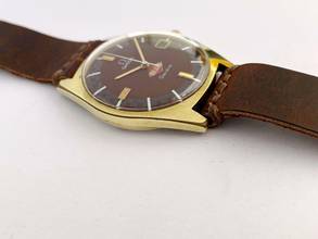 Thumbnail von Omega Genève Vintage 136.041 rare burgundy Inland Dial 136041