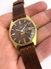 Thumbnail von Omega Genève Vintage 136.041 rare burgundy Inland Dial 136041