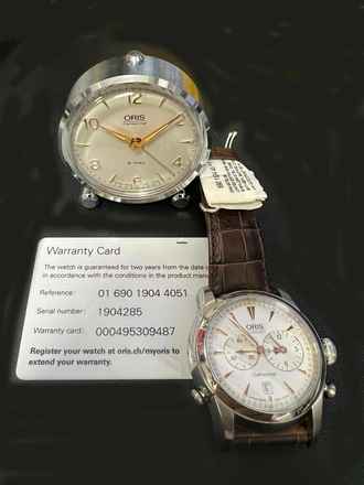  Oris For its centenary Oris launches the Oris Centennial Set 1904 Limited Edition includes an Artelier Worldtimer Automatic Stainless Steel Wristwatch and an 8-Day Alarm Travel clock one of the company’s most iconic historic designs. It is limited to 1