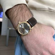 Thumbnail von Rolex Oyster Perpetual Date 1503 dove grey dial yellow gold 18KT 1969's