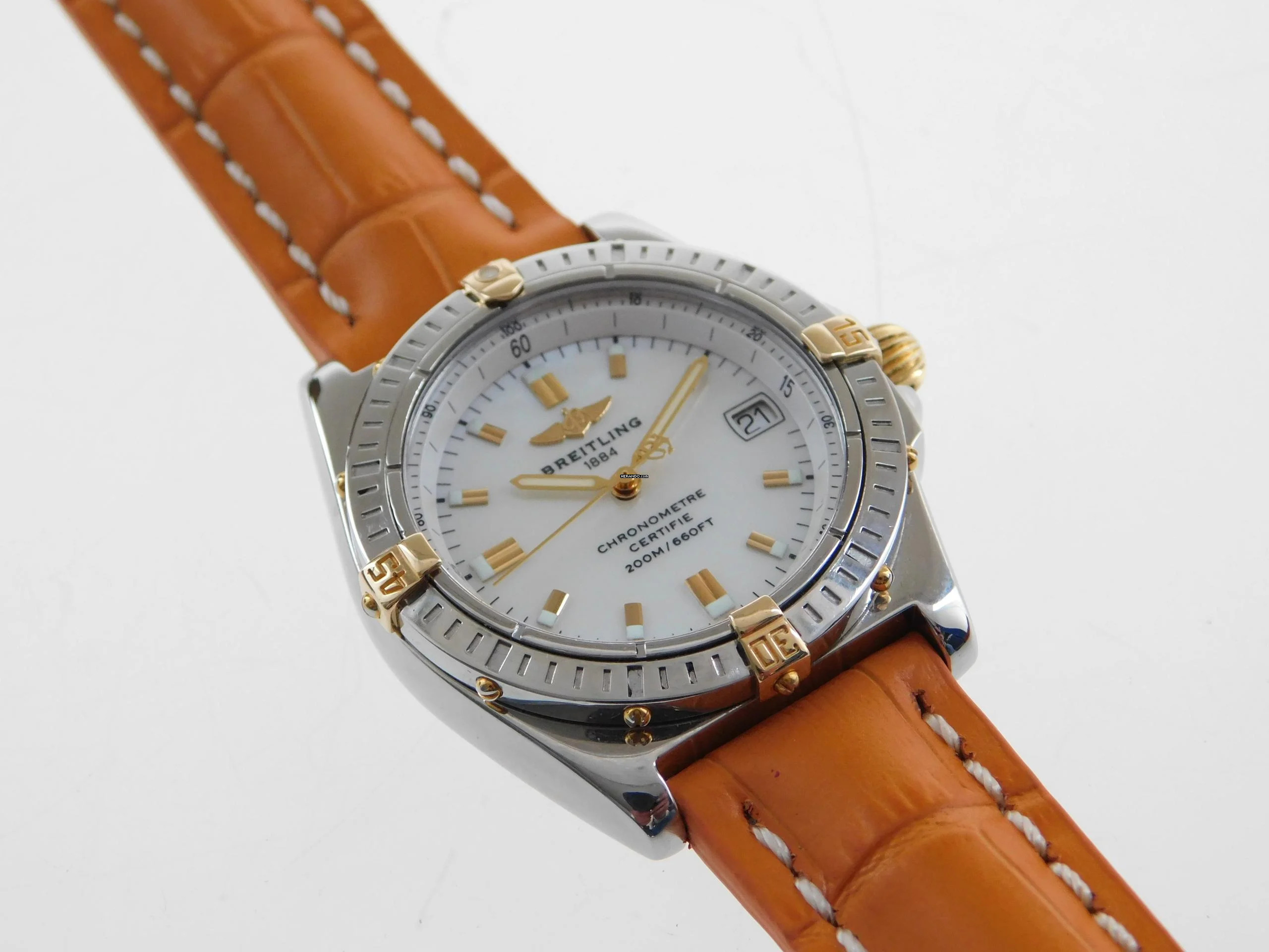 Breitling Callisto Stahl Gold Medium 36mm mit original Perlmuttzifferblatt orangenes Lederband original Schließe