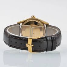 Thumbnail von Rolex Oyster Perpetual Date 1503 Champagne dial yellow gold 18KT