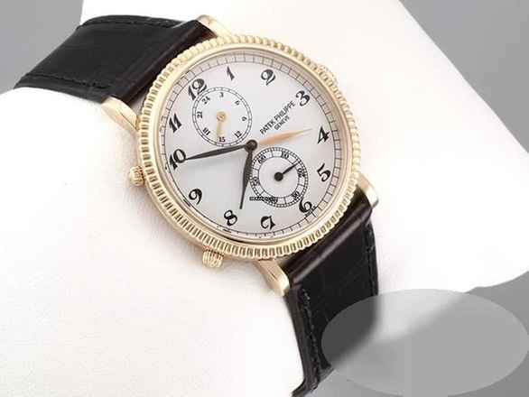  Patek Philippe Travel Time 5034j 2008 Gelbgold 750 Handaufzug Gold 