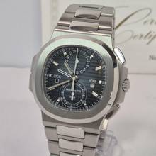 Thumbnail von Patek Philippe Nautilus Travel Time Flyback Chronograph Blue Dial 40.5mm Completo