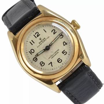  Rolex Oyster Perpetual 3131 BubbleBack Ivory radium dial yellow gold 14KT 1948's 