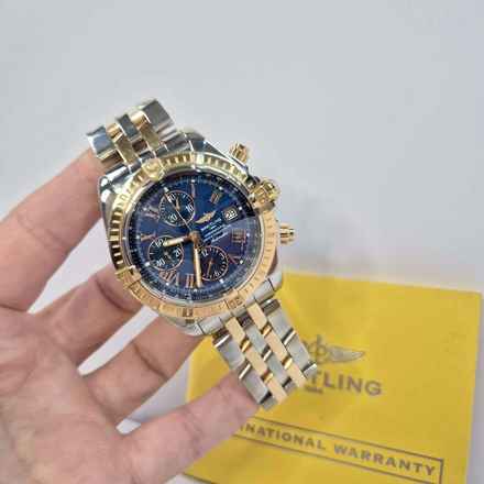  Breitling Chronomat Evolution Ouro Rosé & Aço Blue Dial 44mm Automático Completo 