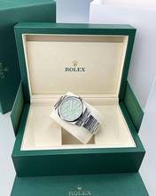 Thumbnail von Rolex Oyster Perpetual 41 Pistachio 02/2026 Ref. 134300 neu/ungetragen Full Set deutsche Auslieferung (LC100) Rolex Price-Hangtag