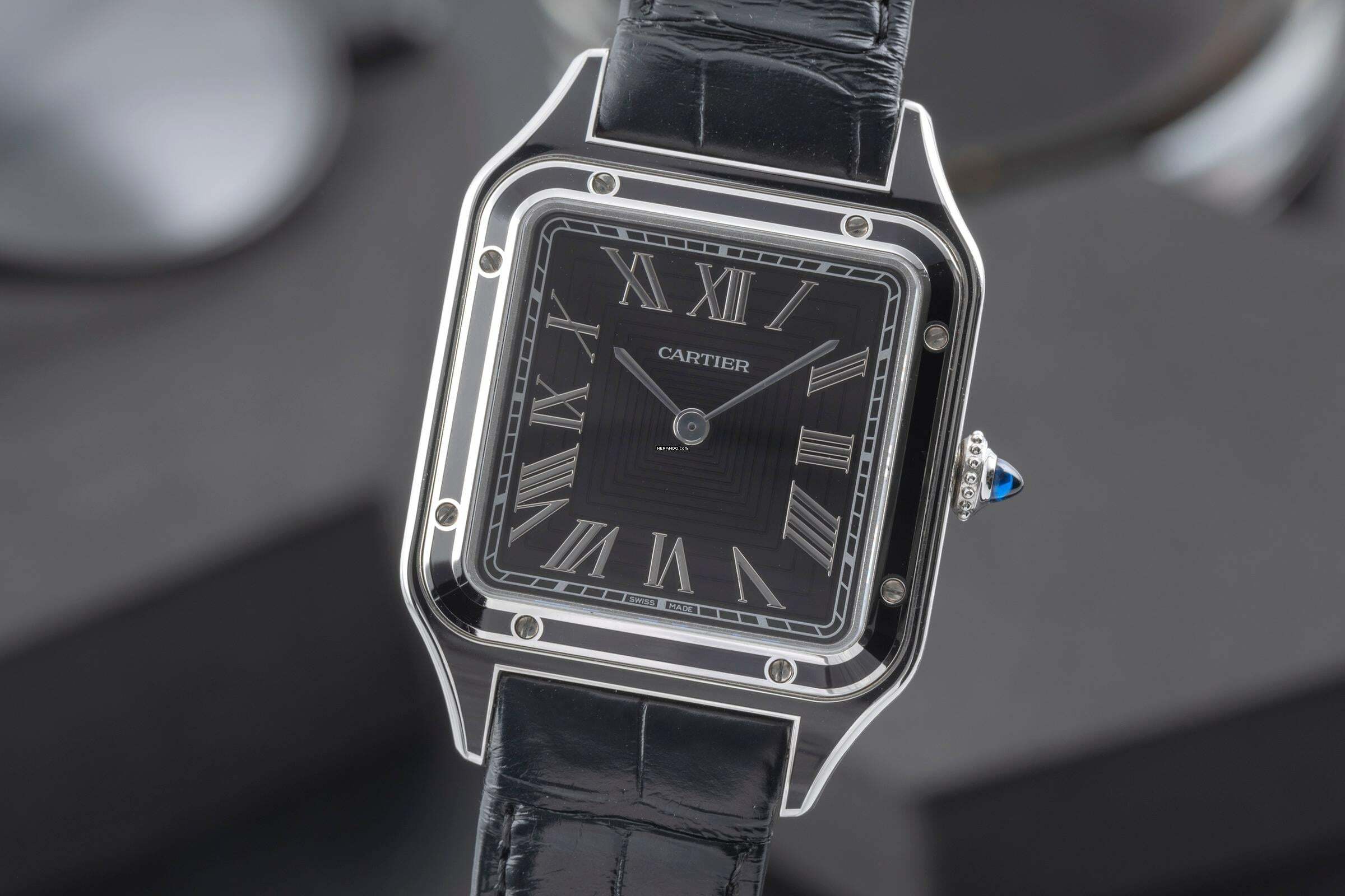 Cartier Santos Dumont Black Lacquer Handaufzug Herrenuhr Ref. WSSA0046 B&P 2023