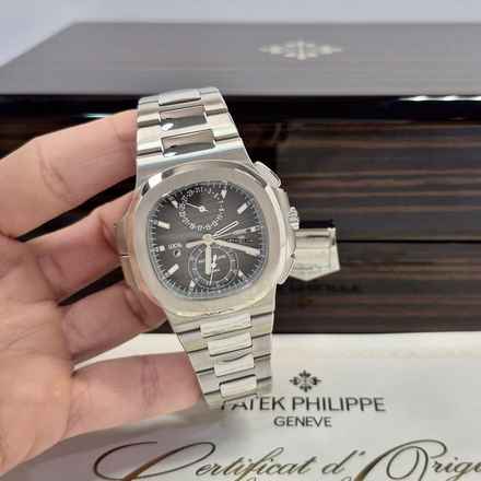 Patek Philippe Nautilus Travel Time Flyback Chronograph 40,5 mm Komplett