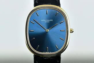 Thumbnail von Patek Philippe Ellipse d'Or 3738 | Certificado alemán 1993 | esfera azul | oro amarillo